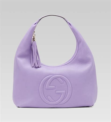 cutest purple gucci purses.